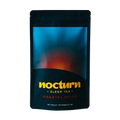 Nocturn Sleep Tea package with 'Coastal Spice' flavor on a white surface.