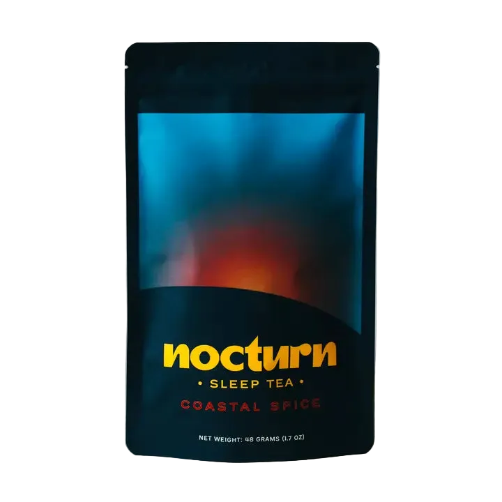 Nocturn Sleep Tea package with 'Coastal Spice' flavor on a white surface.